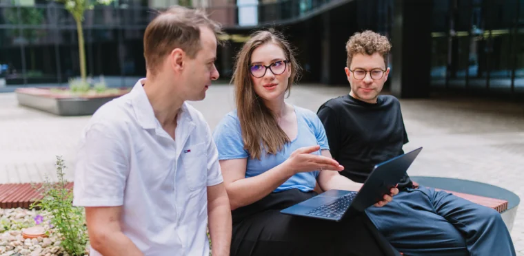 Tech Lead, UI Designer and New Business Developer talking
